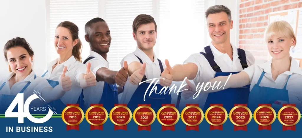 40 years in business proud employees giving a thumbs-up. 