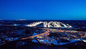 Illuminated ski village at dusk